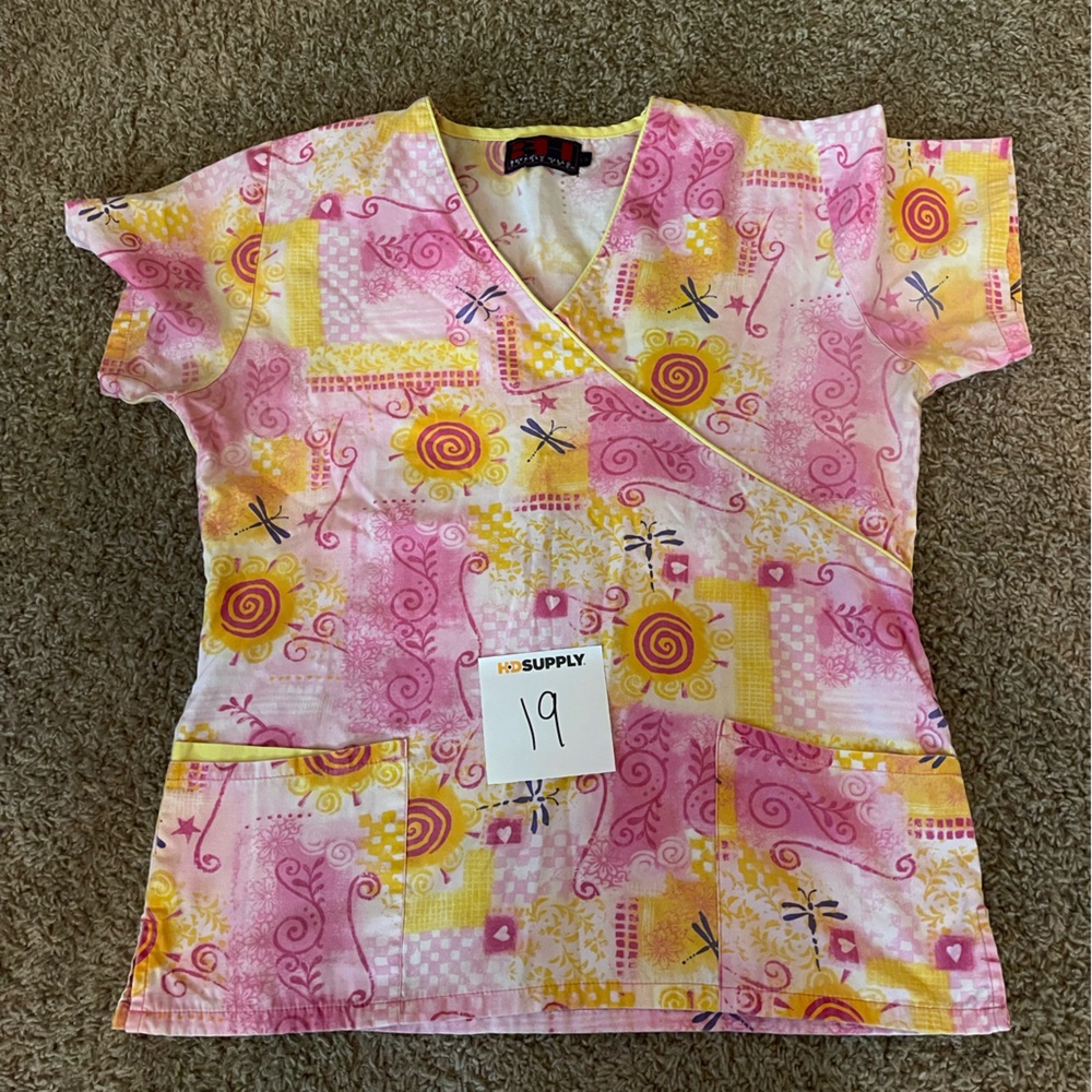 Semi-used cross body scrub shirt with tie in the back